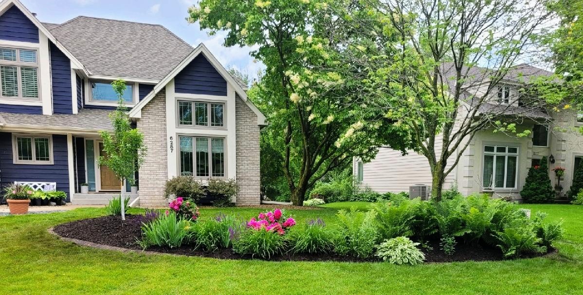 Perennial planting bed along a home