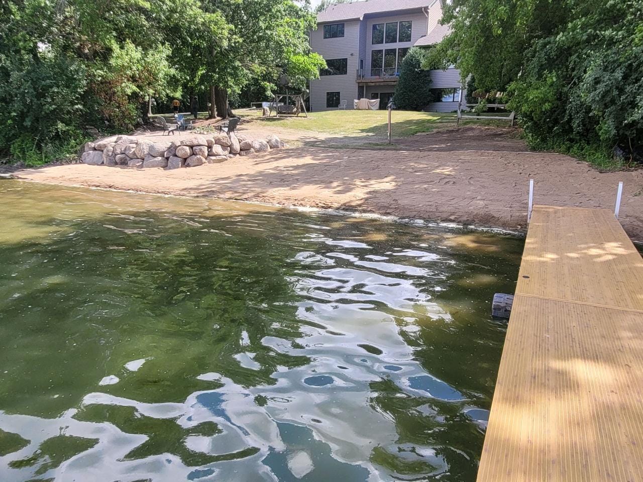 Restored lakeshore with natural plantings