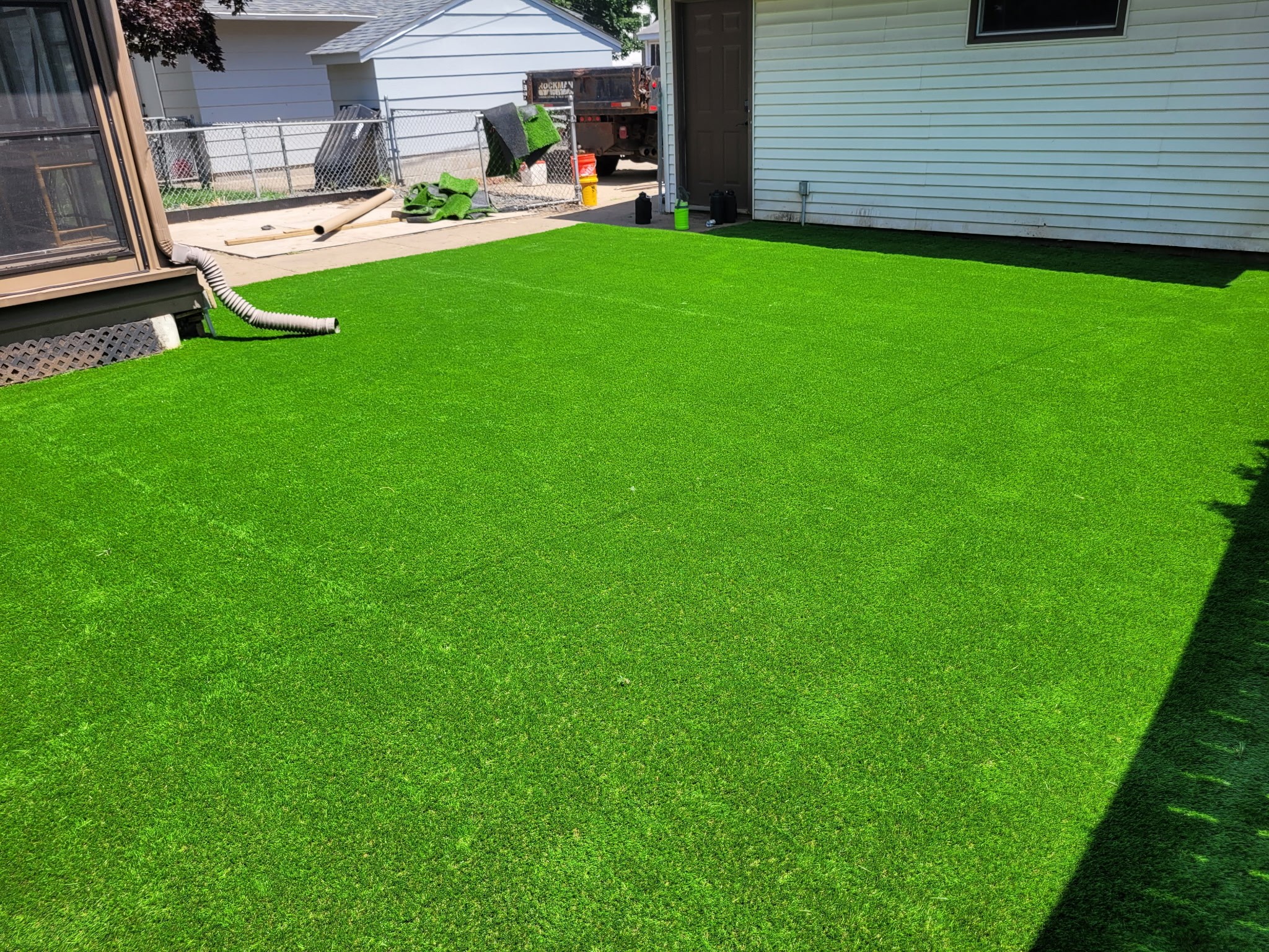 Backyard fire pit area with pavers